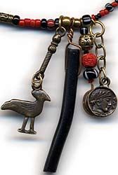 dangle with coin & bird